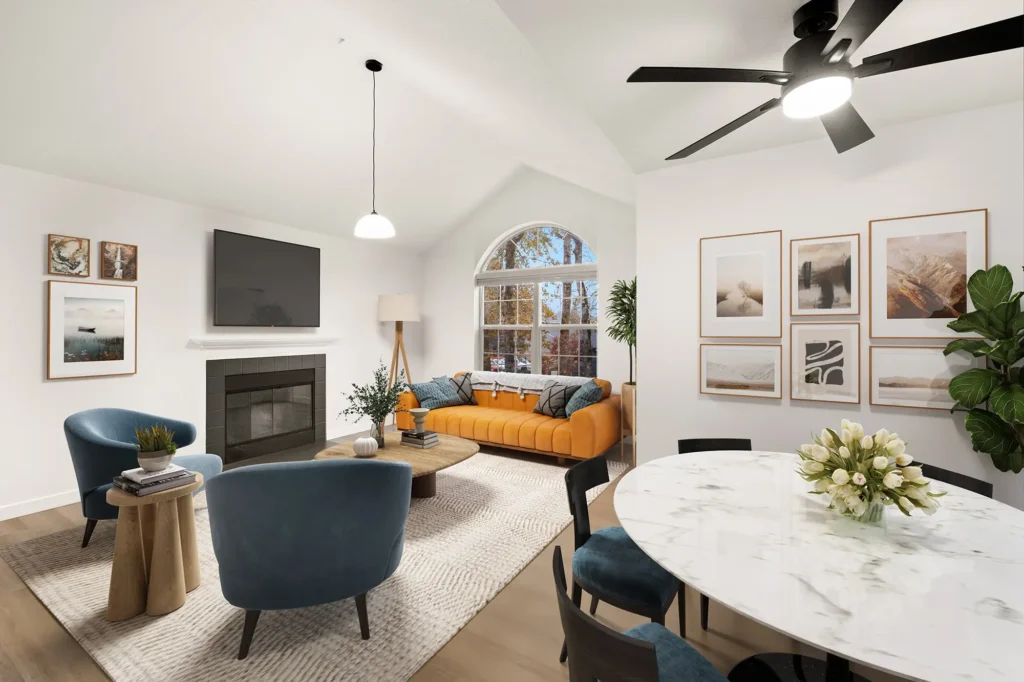 Furnished living and dining area with fire place and tv at Larkspur Place apartments in Vancouver